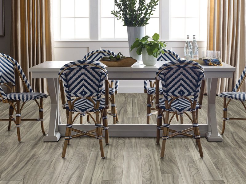 dining room with blue and white chairs